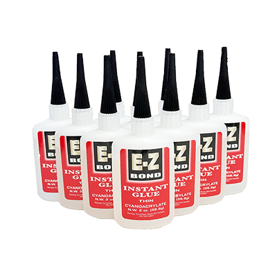 Bulk Easy Bond glue bottles displayed in group for wholesale or workshop use