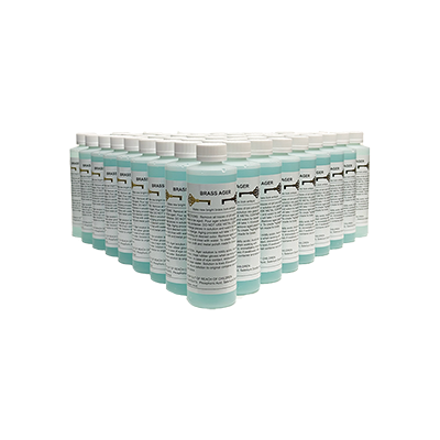 8-ounce Brass Ager Distributor Pack bottle, front label with product name