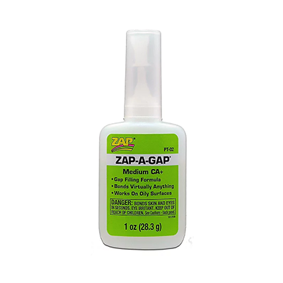 A 1oz bottle of Zap-A-Gap Medium CA glue with a label that includes the product name and description