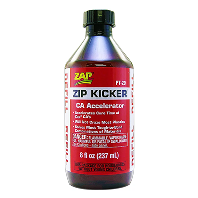 A bottle of Zip Kicker CA Accelerator, which is designed to speed up the cure time of CA glues.
